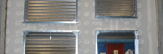 A fire resistant wall being tested in a facility. 