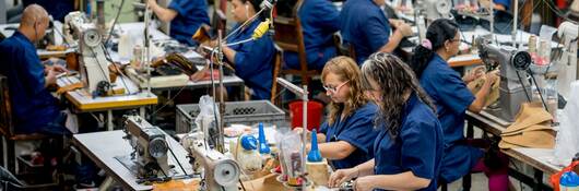 Manual workers working at a factory.
