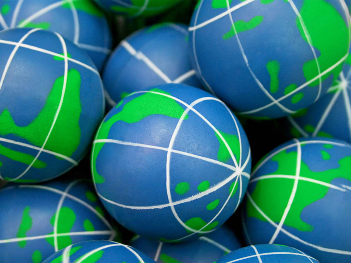 Close-up of squishy balls that look like the Earth. 