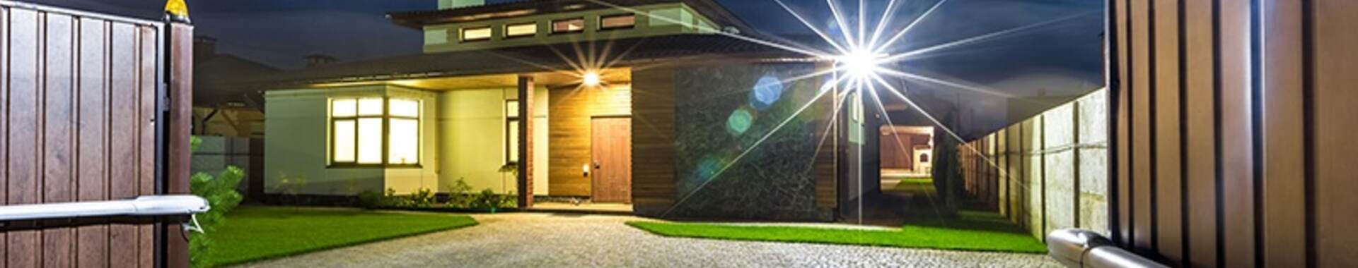 Luxury house with spotlight and electric gate security