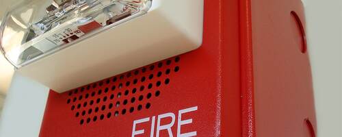 Close-up of fire alarm with speaker and strobe